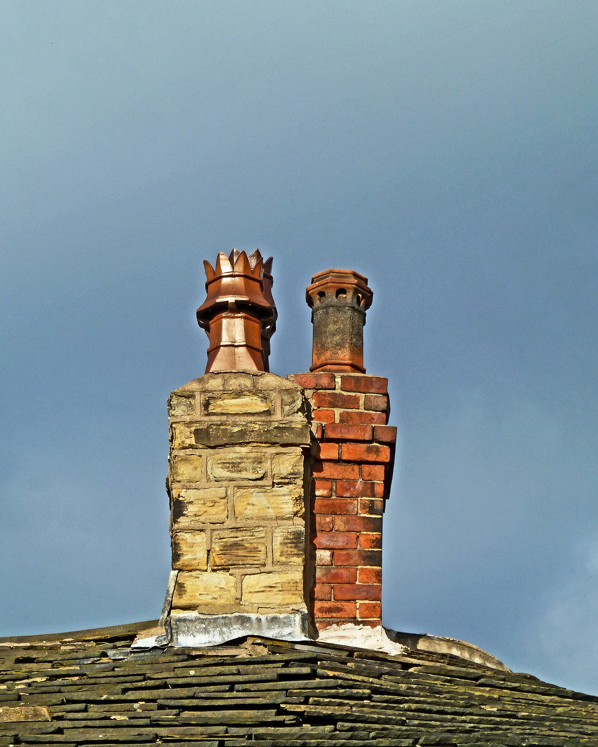 Brick and stone chimney construction by masonry contractor Indianapolis, IN Brick and stone chimney construction by masonry contractor Indianapolis, IN